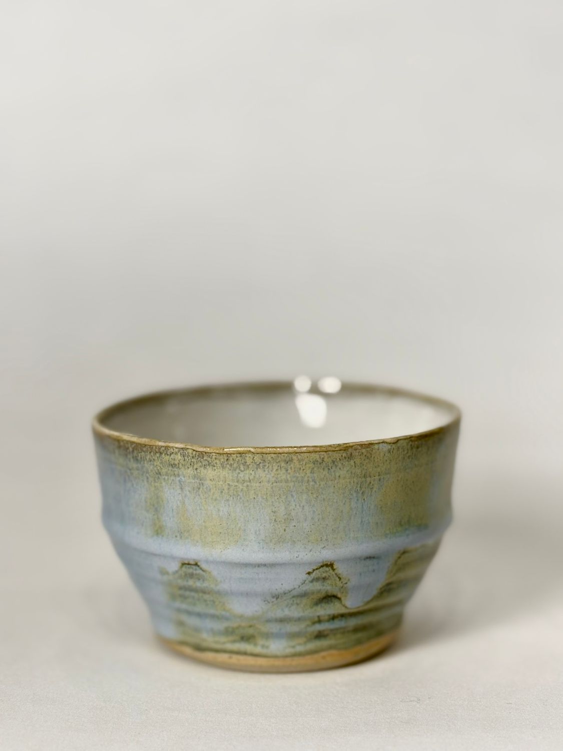 Flat white cup - Soft blue glaze, with honey flux glaze inside