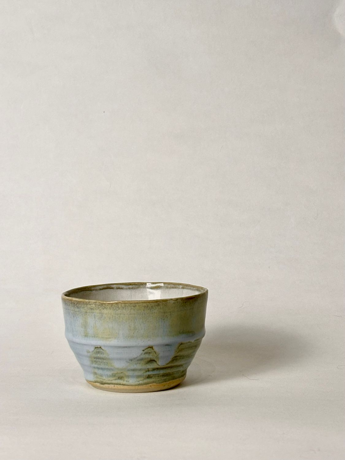 Flat white cup - Soft blue glaze, with honey flux glaze inside