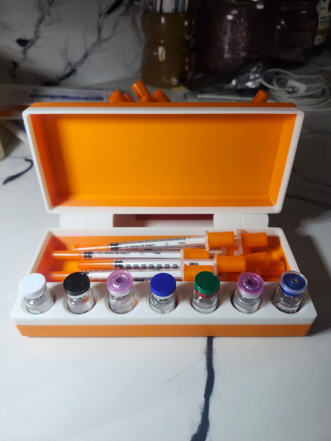 Vial case and syringe holder