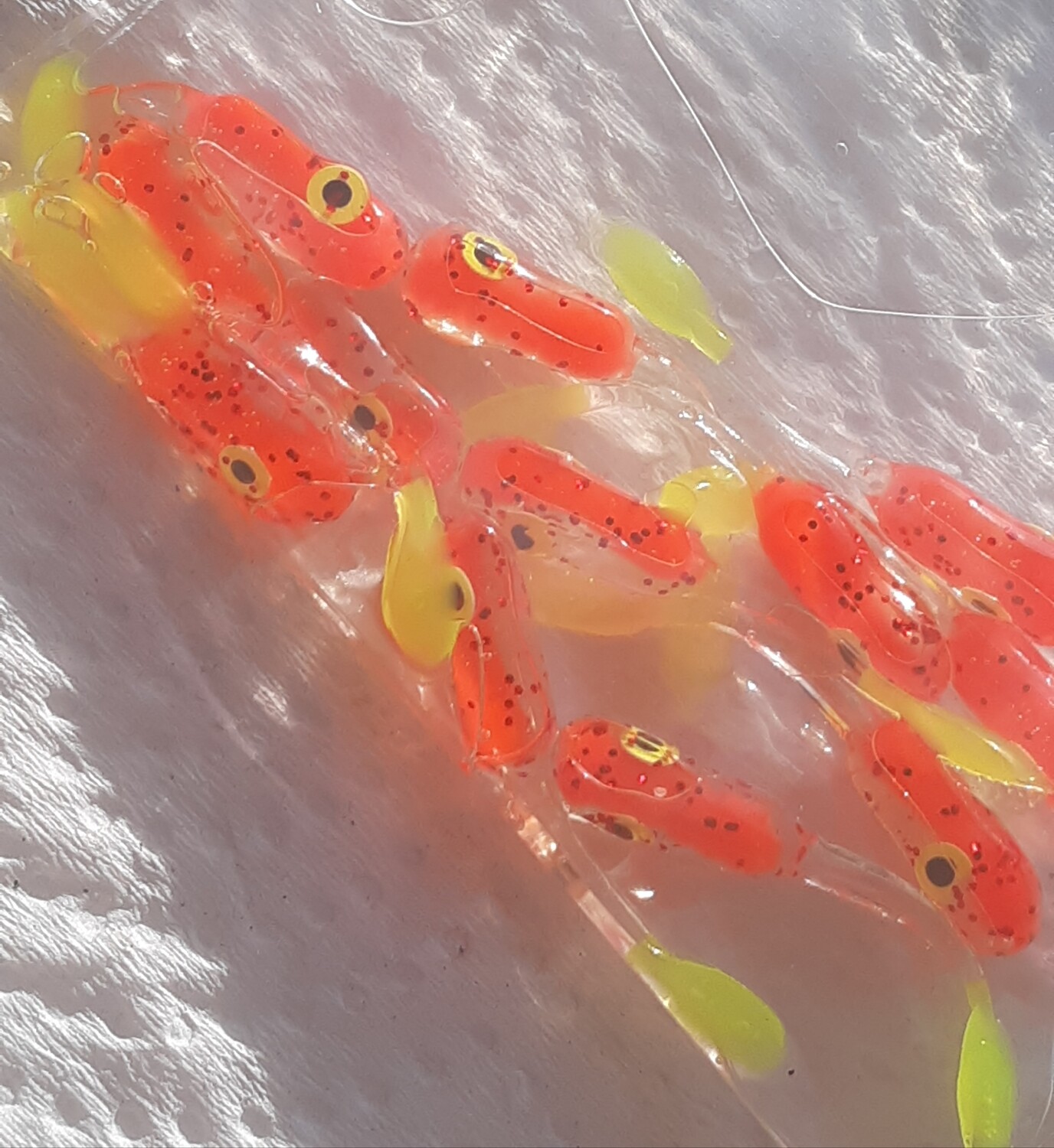 1.5&quot; Crappie killer Jr trio sizzlin orange, clear, &amp; Chartreuse yellow red flake dipped 12 per pack