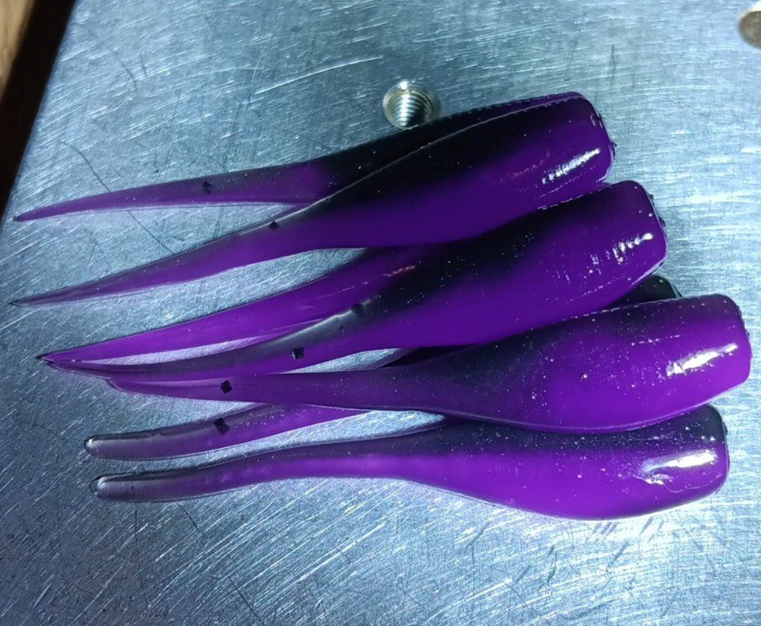 2&quot; Candy shad 
12 per pack 
Black &amp; purple rain