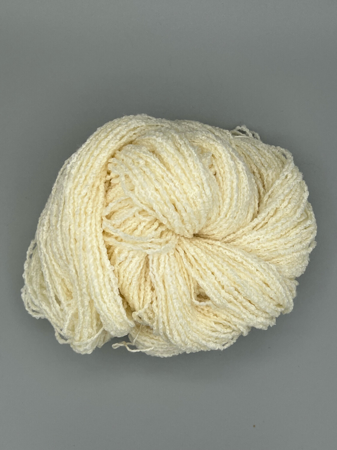 Merino Boucle DK 220 m / 100g 1/2,2 NM