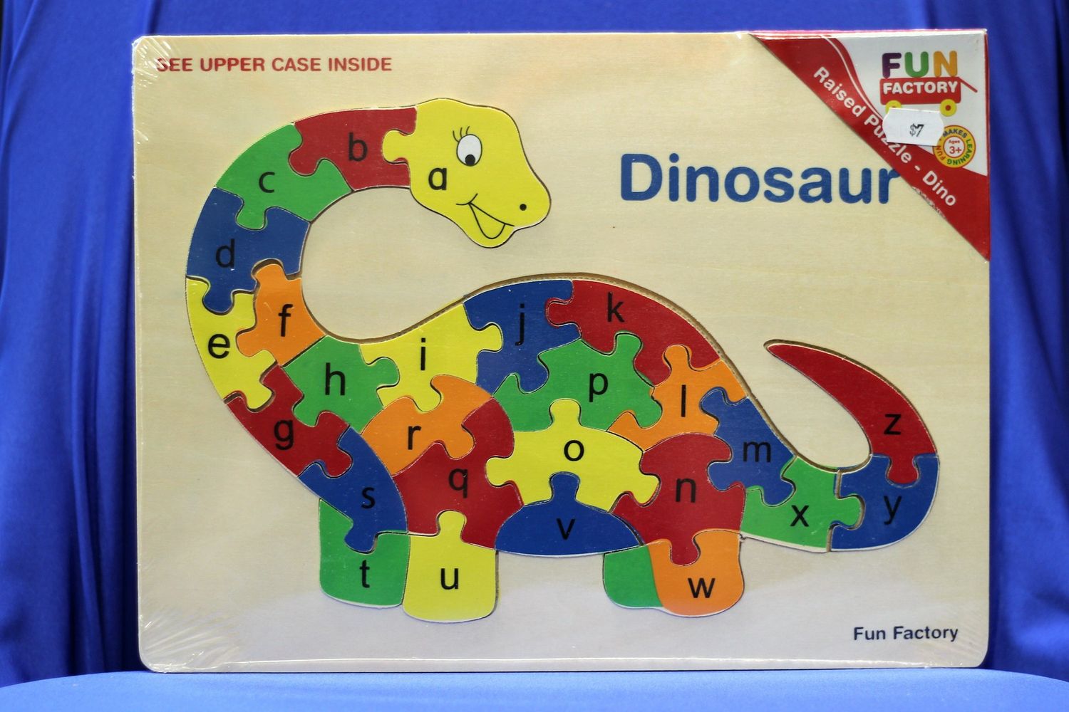 Raised Puzzle Dino