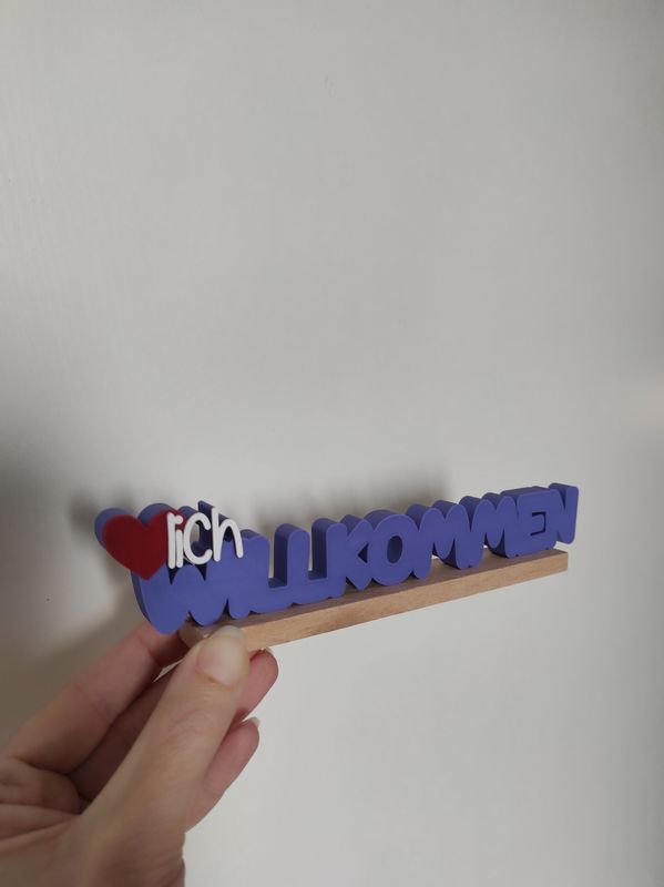 Schriftzug "❤️lich Willkommen"