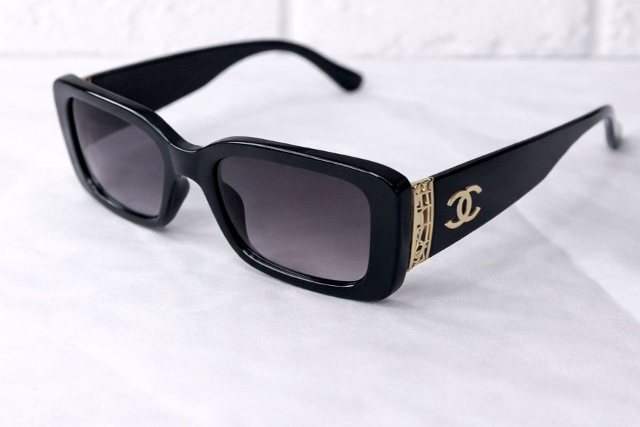 Black and gold cc sunglasses