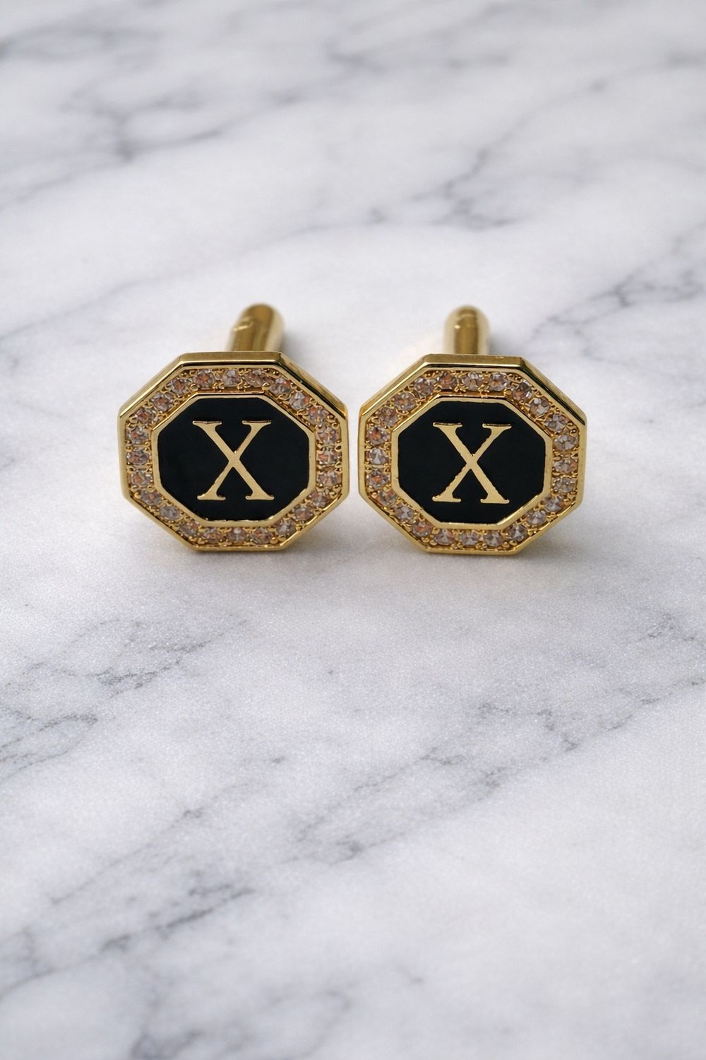 Gold in color initial cufflinks X