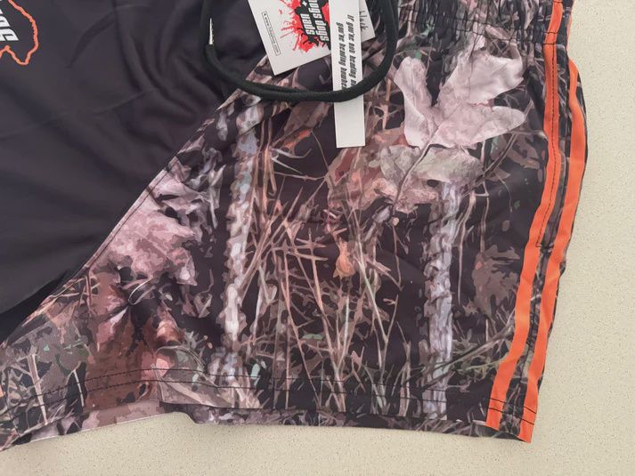 Hogs Dogs and Quads Adult Real Tree Camo Footy Short