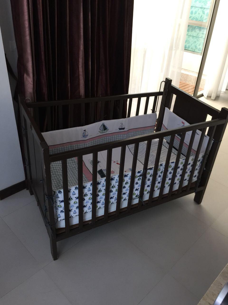 Wooden Baby Crib with Bumpers,Linens and Mosquito Net Please message us to check availability before ordering via chat.