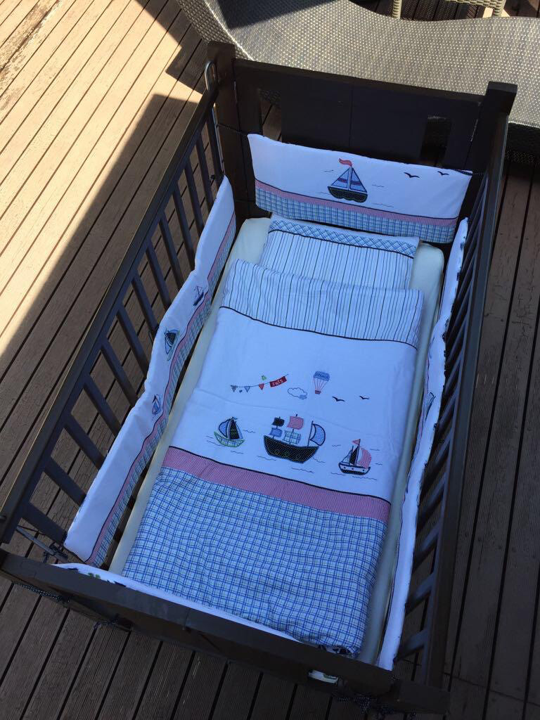 Wooden Baby Crib with Bumpers,Linens and Mosquito Net Please message us to check availability before ordering via chat.