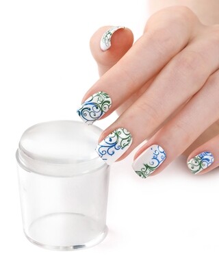 Nail stamper with scraper