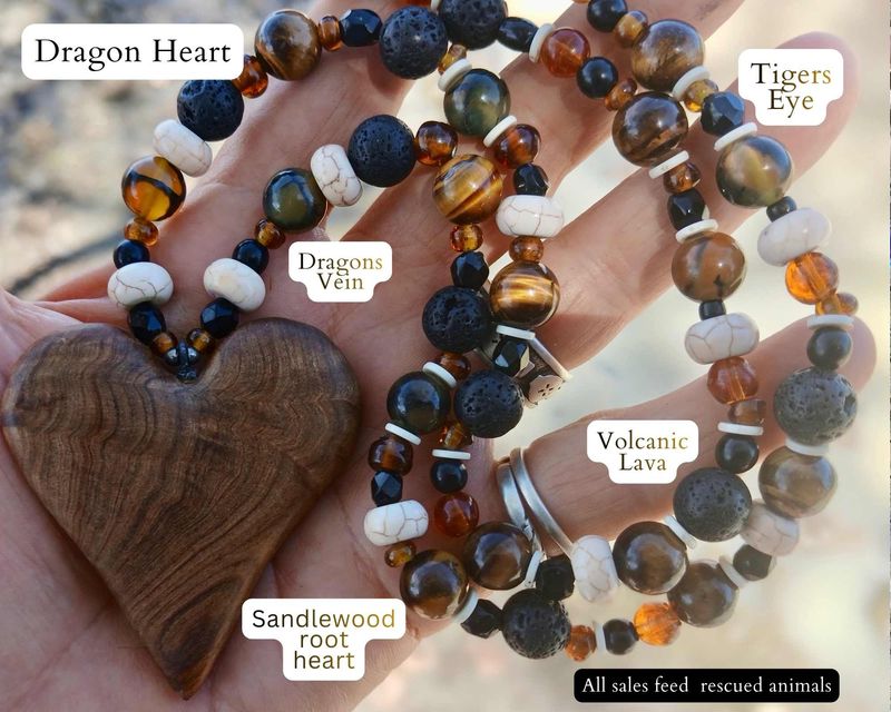 Dragon Heart - Connection- Sacred Power. Carved Sandalwood Root heart with Tigers Eye, Dragon's Vein, and volcanic Lava and glass beads. Powerful Priestess talisman