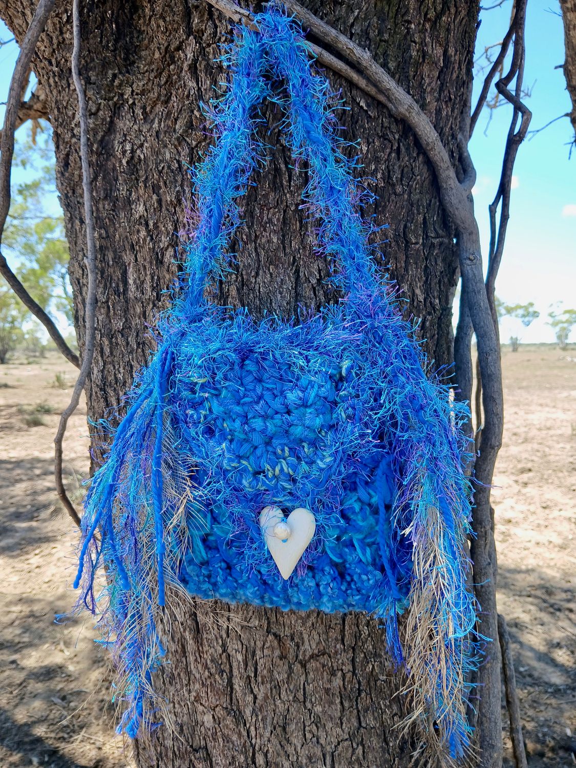Ulysees Butterfly Medicine Bag with Emu feathers and Sacred Pouch for crystals with carved camel bone heart button