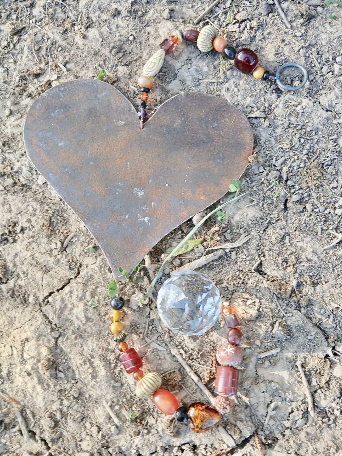 Sacred Fire sun catcher with recycled metal heart - fill your life with rainbow sparkles