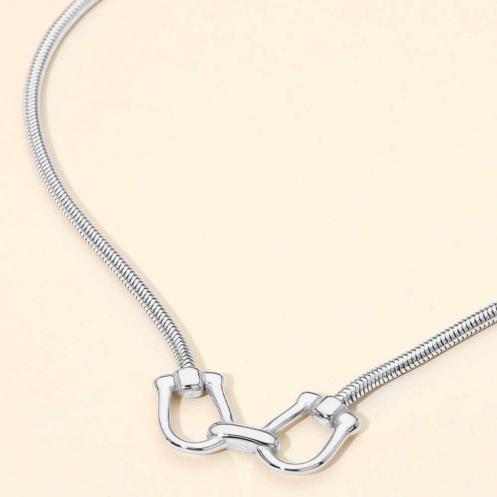 Stainless Steel Linked Horsebit Pendant Necklace: Rhodium