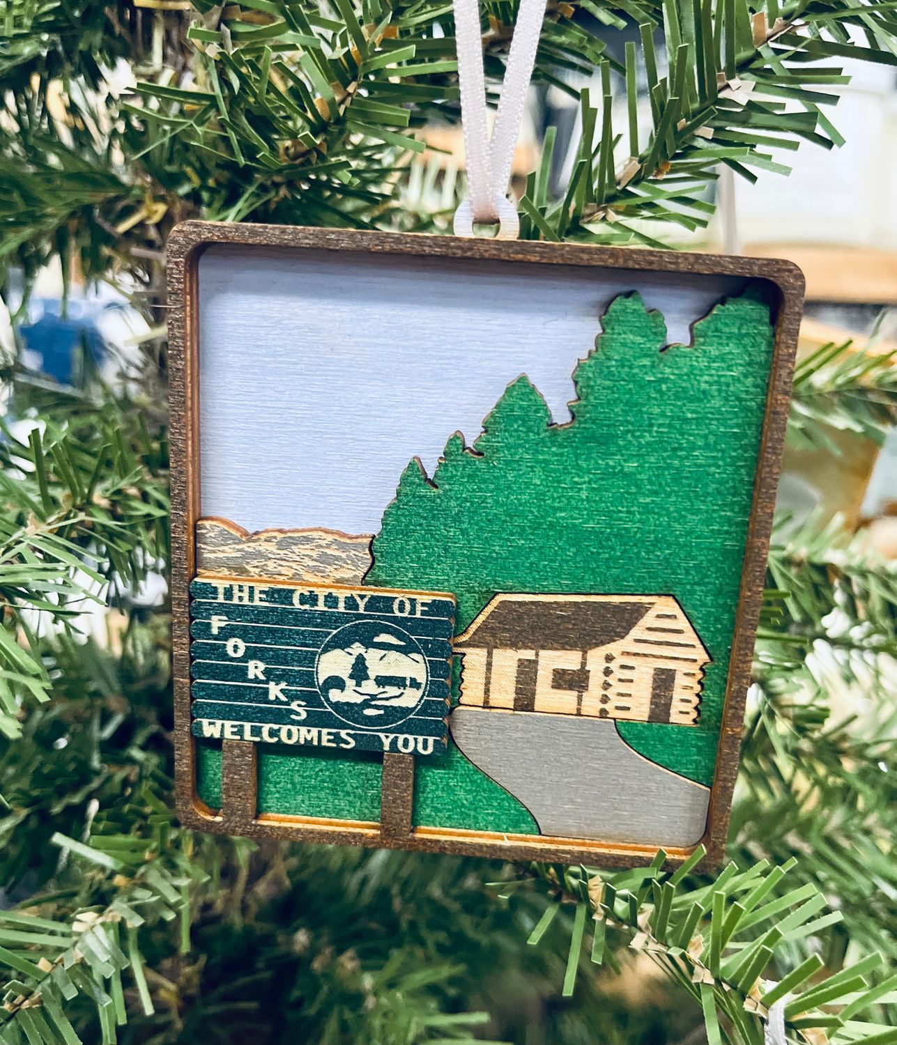 City of Forks Cabin Scene Ornament