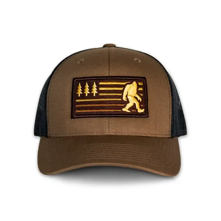 Bigfoot Sasquatch American Flag Trucker Hat, Color: Coyote Brown / Black