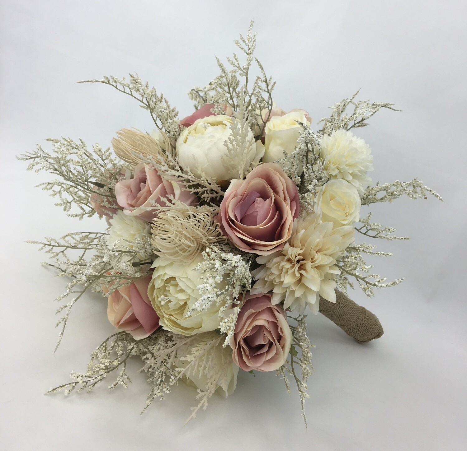Hand-tied artificial flower dusty pink roses bridal bouquet