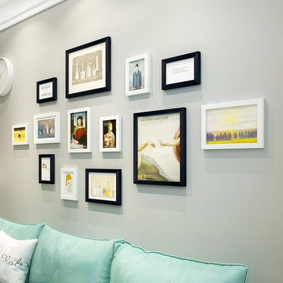 TEOREMA Set di 13 cornici portafoto da parete, composizione 130 × 65 cm