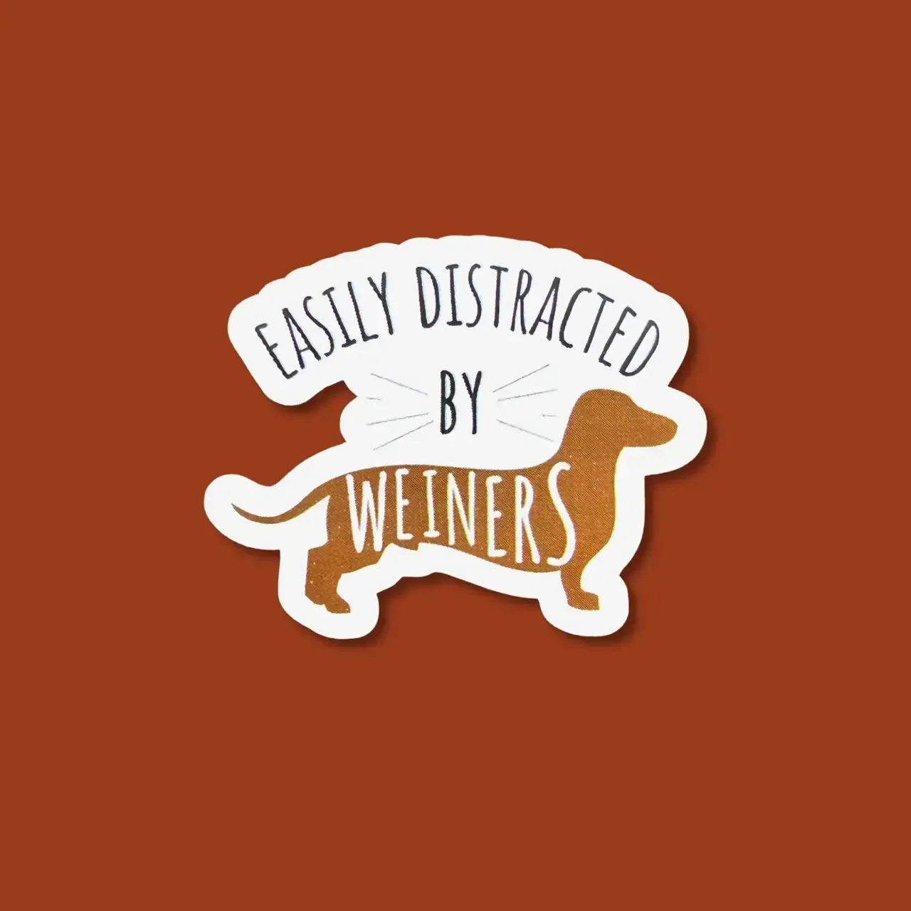 NOVELTY STICKER EASILY DISTRACTED BY WEINERS