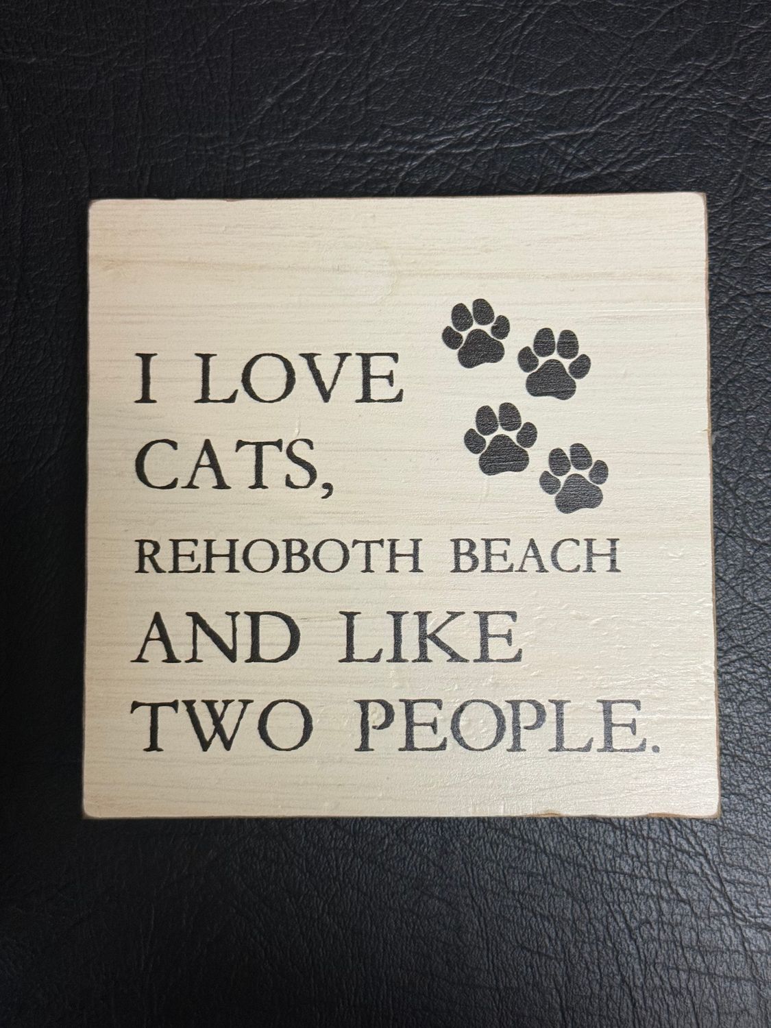 REHOBOTH CATS AND TWO PEOPLE BLOCK SIGN