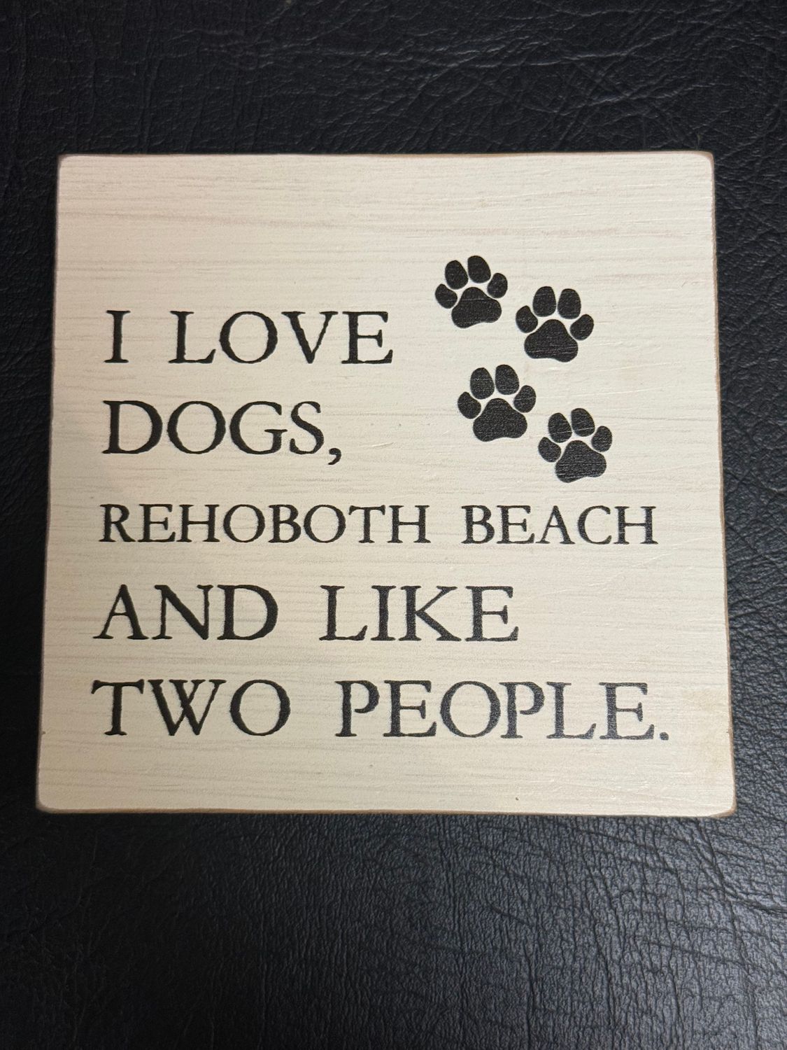 REHOBOTH DOGS AND TWO PEOPLE BLOCK SIGN