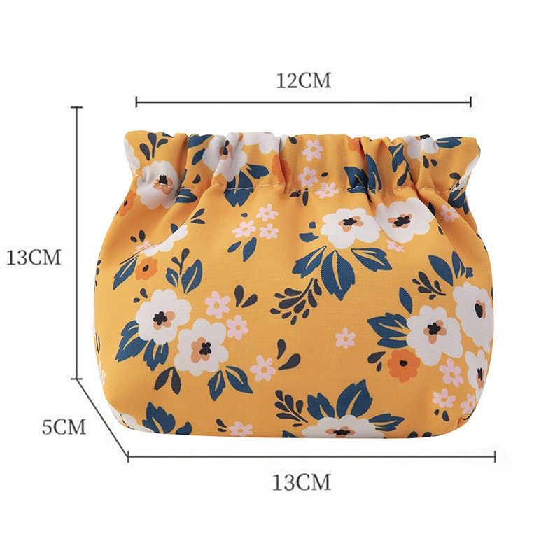 XK Lipstick bag with floral pattern: yellow 56510