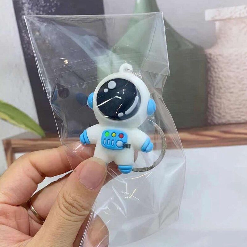 Xinmeng 001 Cartoon Astronaut Pendant Key Chain Soft Rubber Doll: L Flat Circle Blue Spaceman 65132