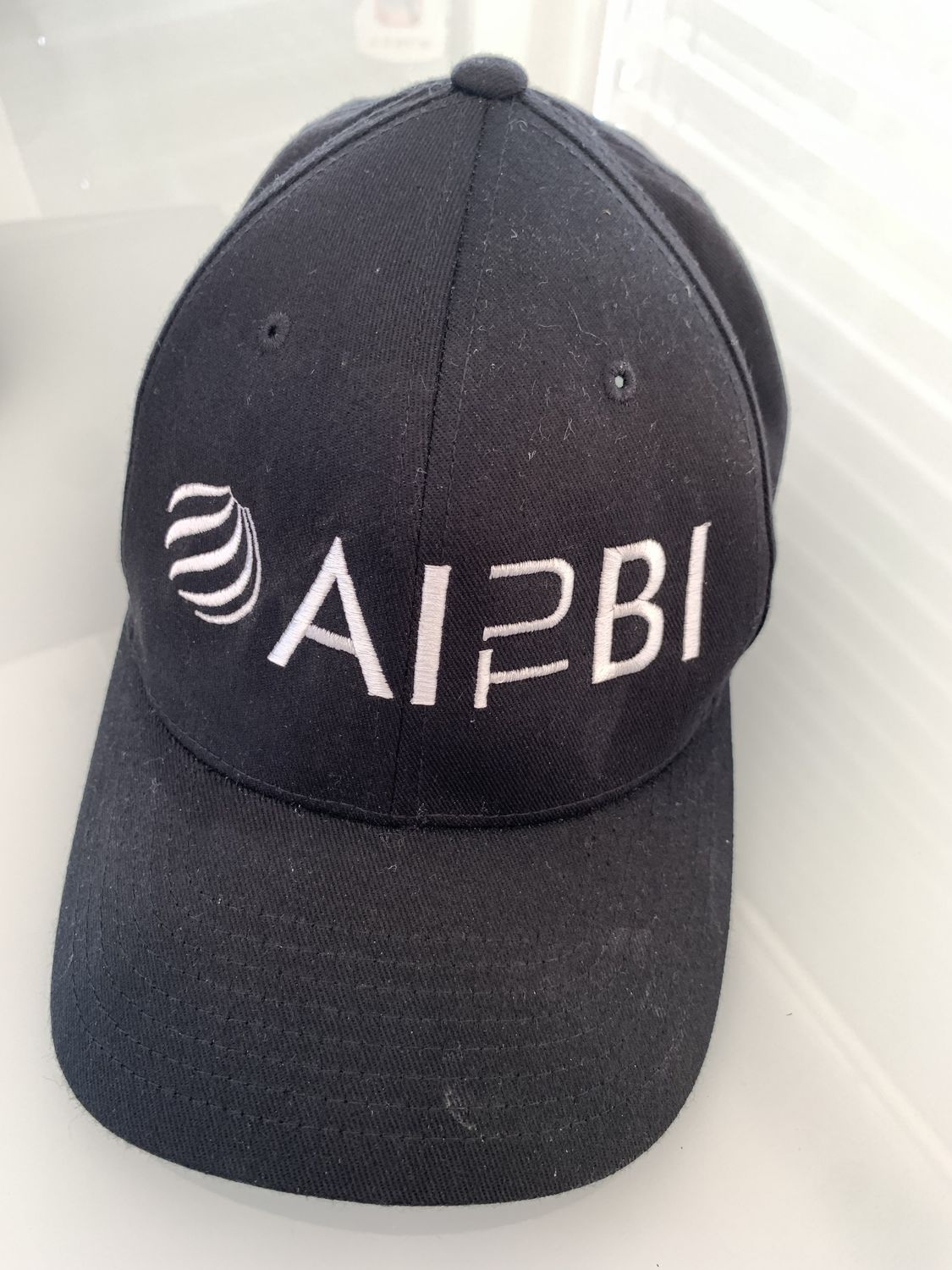 Black AITUBI Hat