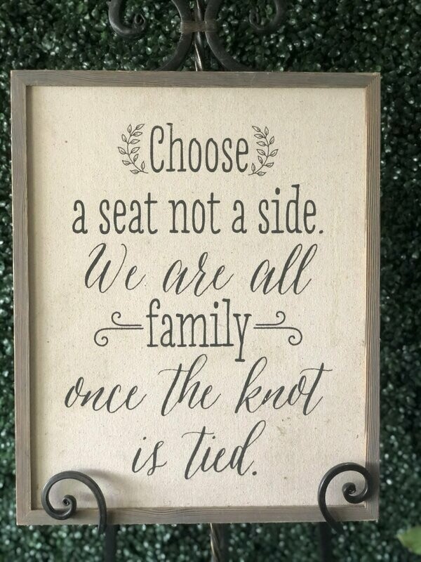 "Choose a seat, not a side" Sign