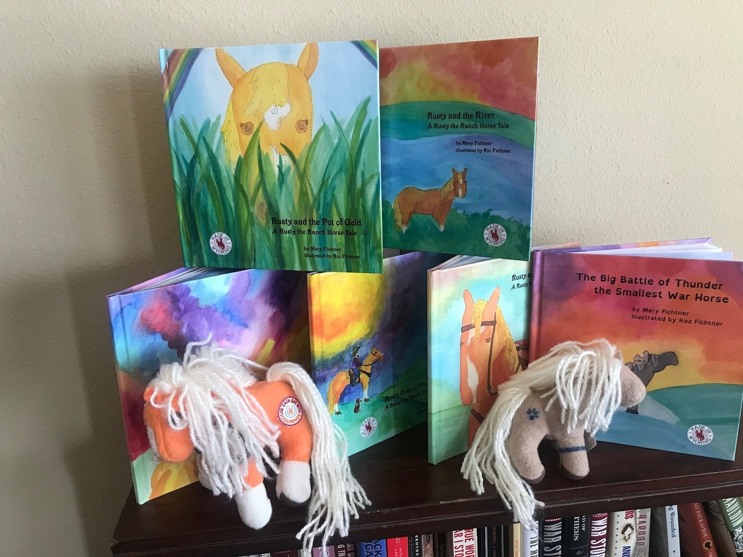 All six books with plush Rusty and plush Thunder