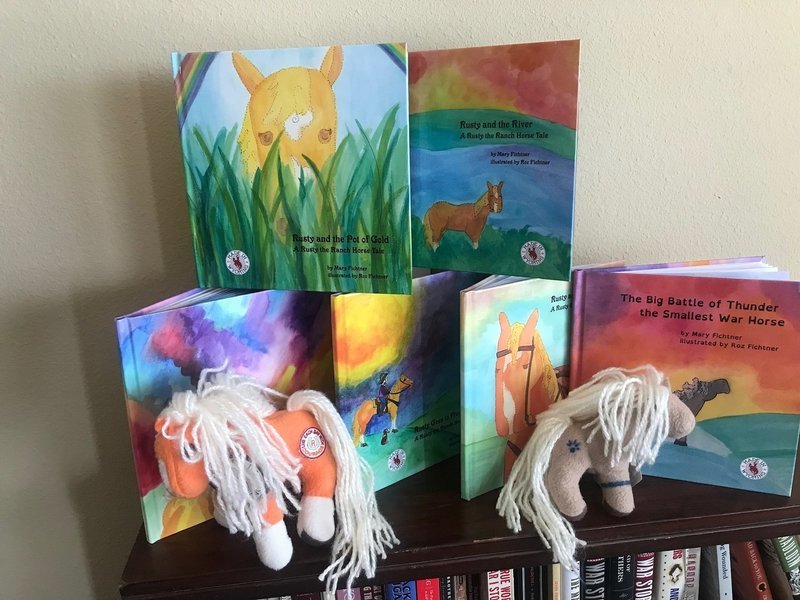 All six books with plush Rusty and plush Thunder
