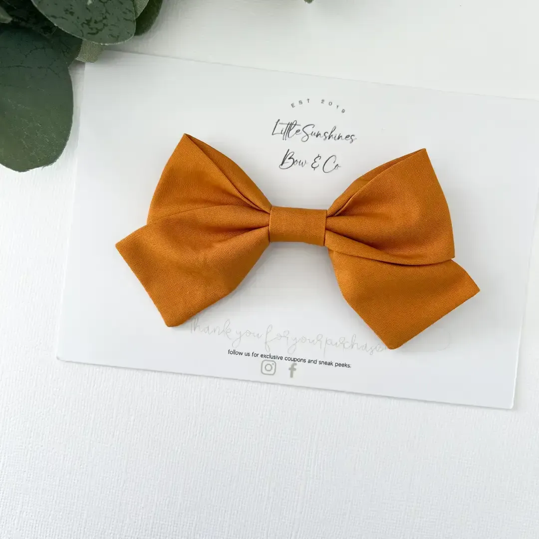 Raw Gold Pinwheel Hair Bow