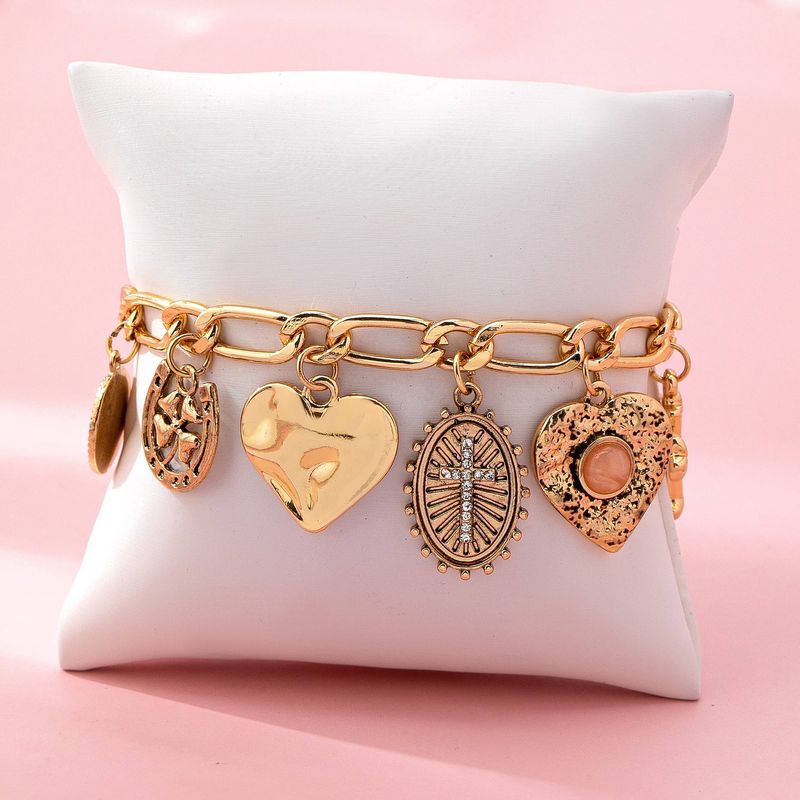Charm Bracelet-Cross Heart Oval Motifs
