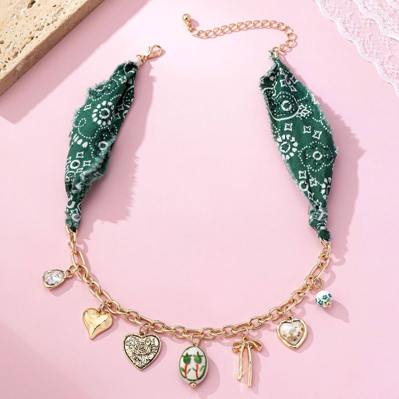 SCARF CHARM NECKLACE-PORCELAIN HEART BOW