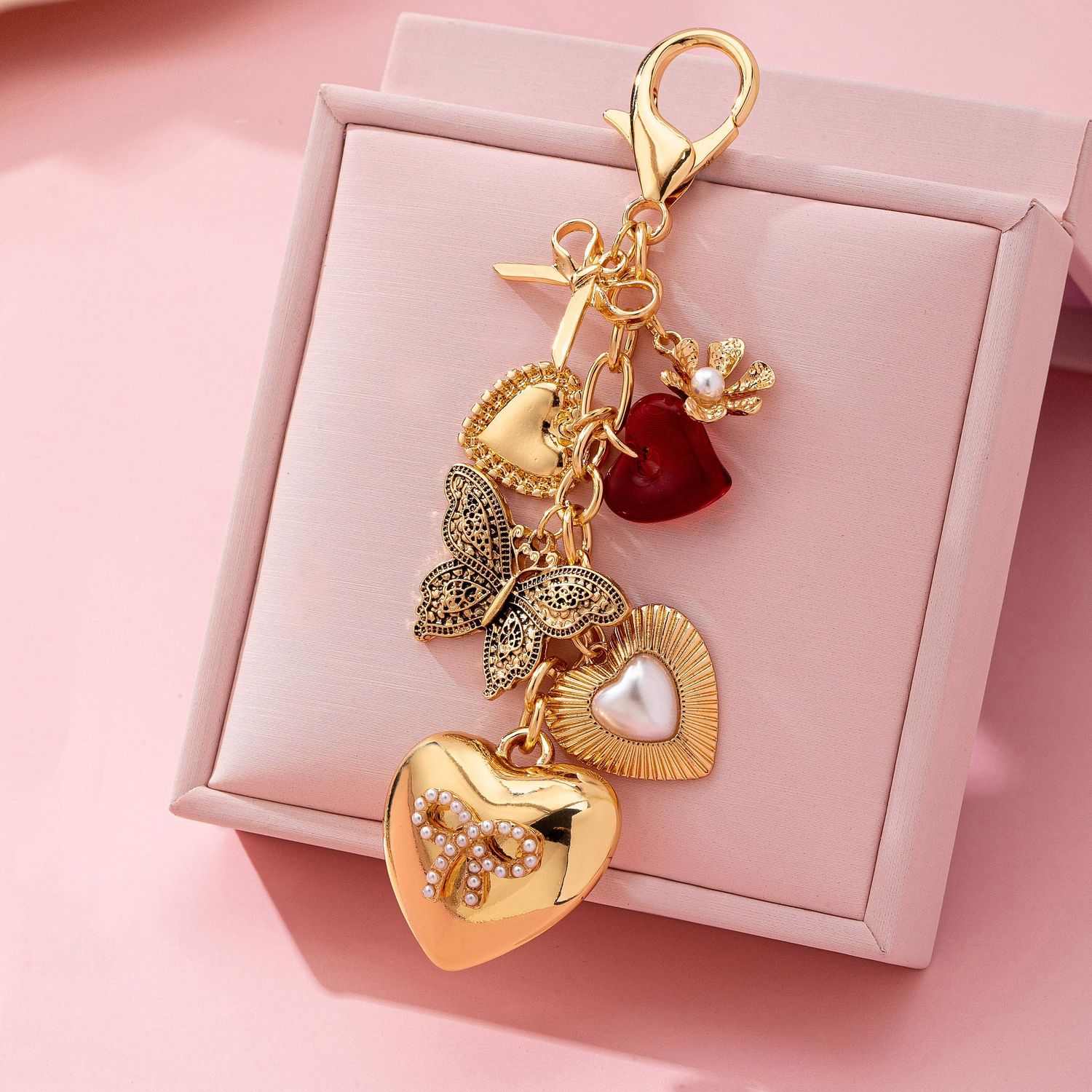 BAG CHARM-BUTTERFLY CHARM RED, Color: Gold