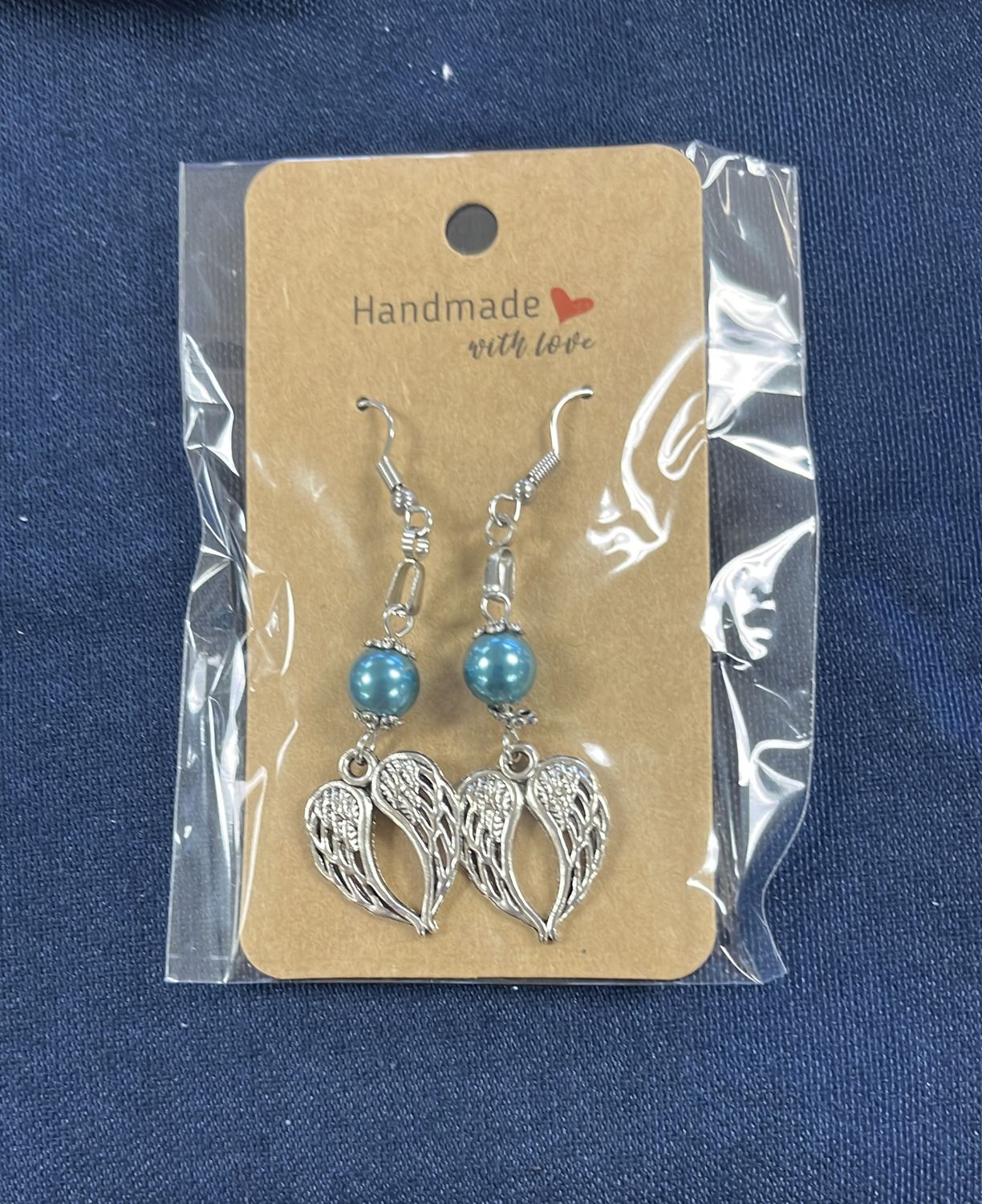 Blue pearl wing earrings 