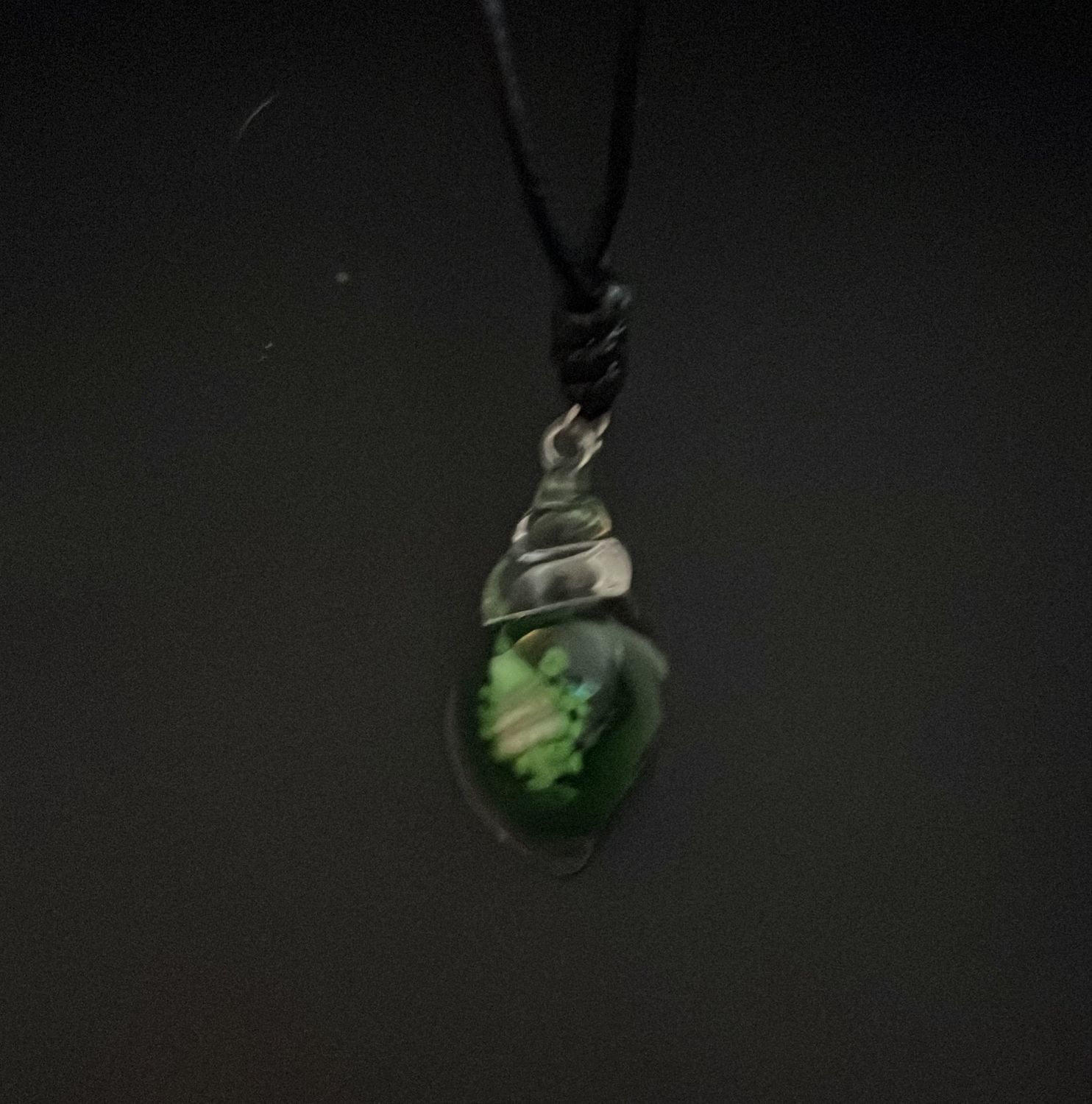 Green glass sea shell