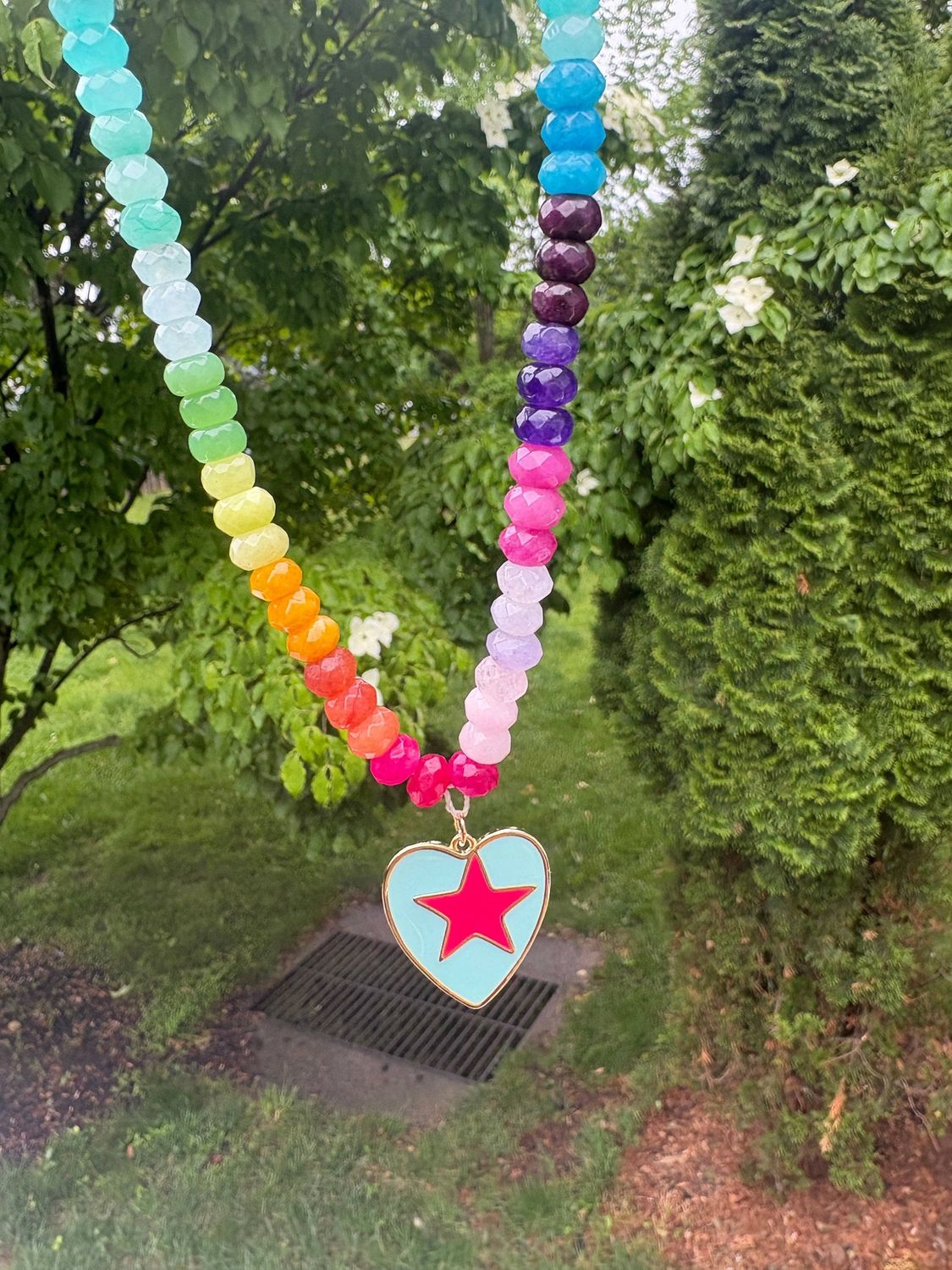 Rainbow gemstone heart charm necklace