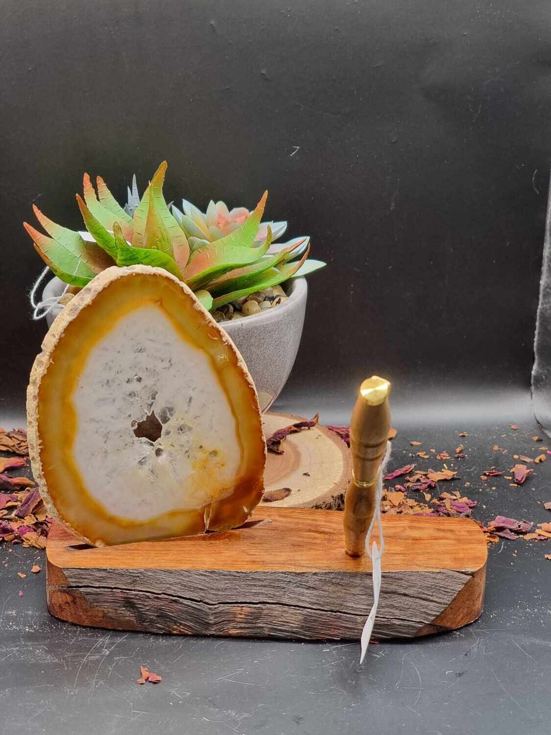Agate slice in holder with pen