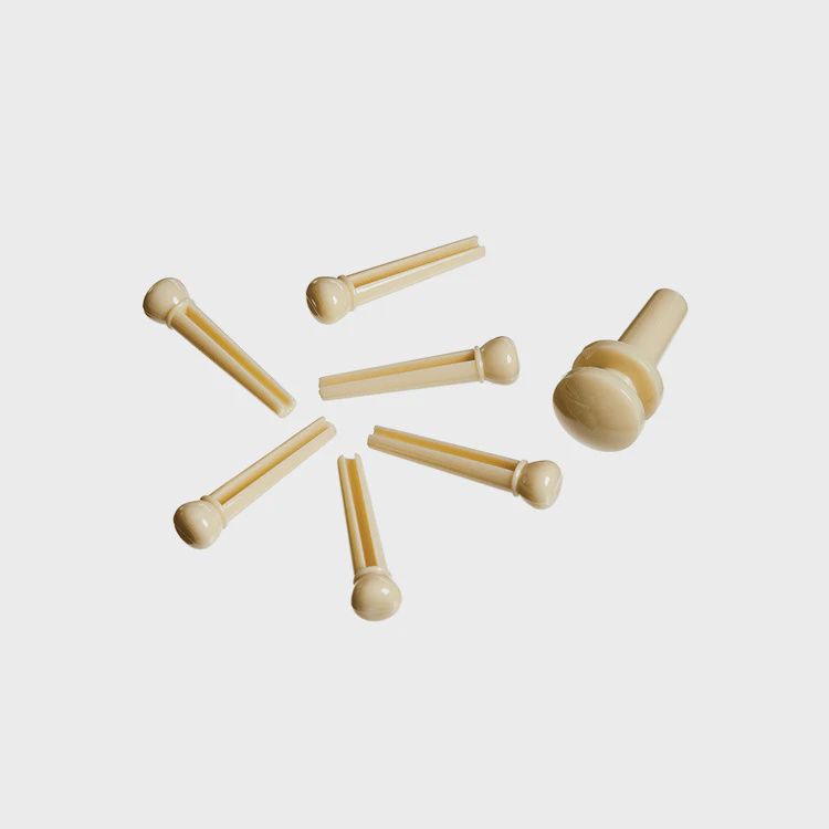 D'Addario Injected Molded Bridge Pins with End Pin, Set of 7, Ivory