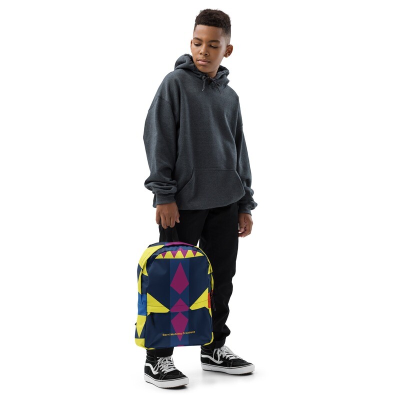 Yellow, maroon &amp; blue geometric shapes cover this backpack.