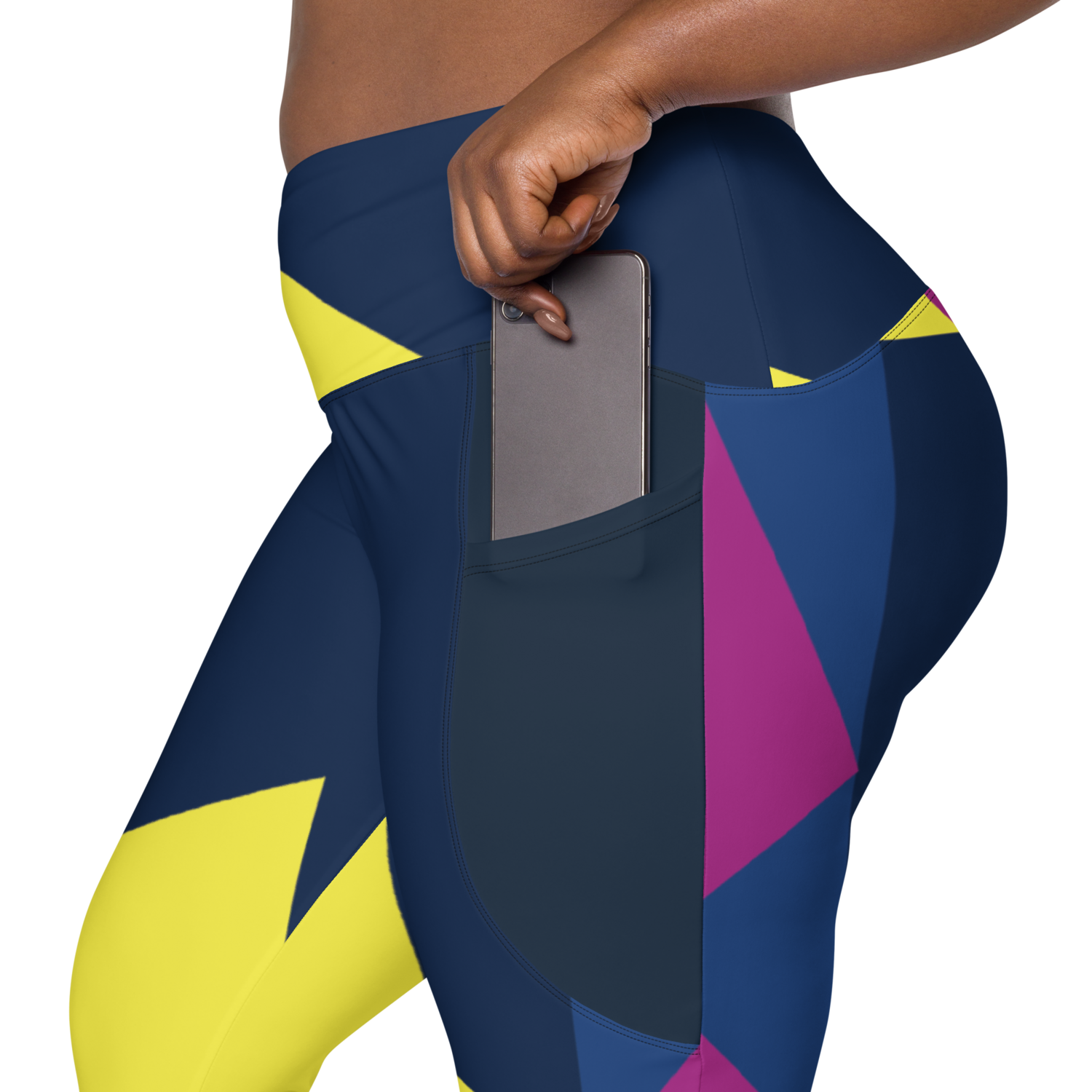 Yellow, maroon &amp; blue geometric shapes cover the leggings. Has two slender pockets perfect for cell or slim wallet.