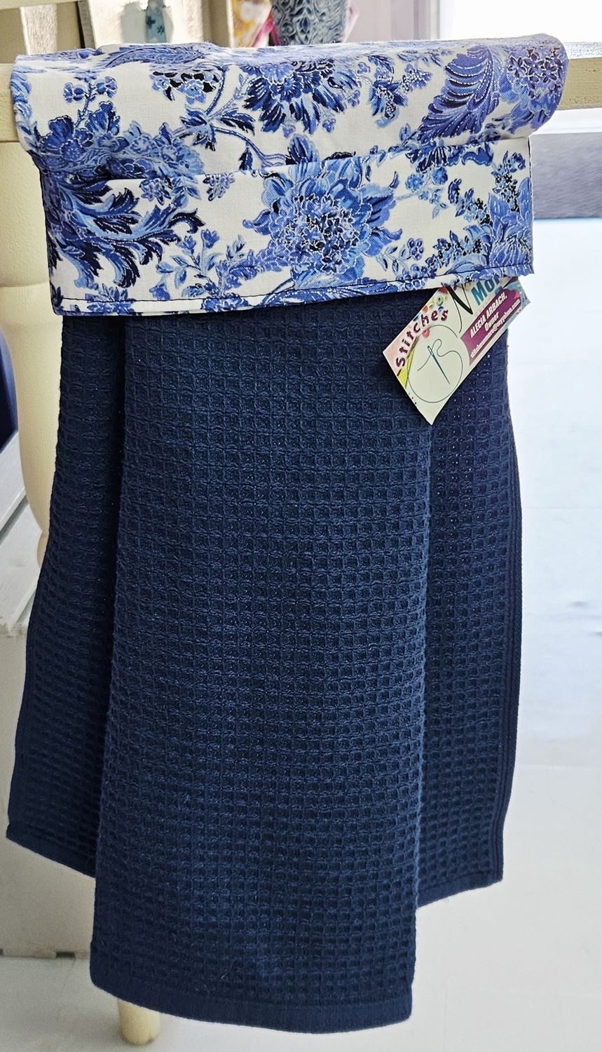 White/Blue floral w navy towel