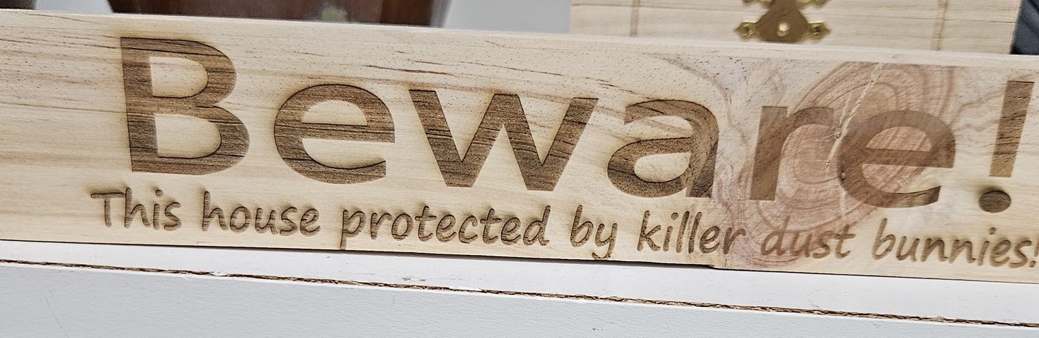 wood block beware dust bunnies