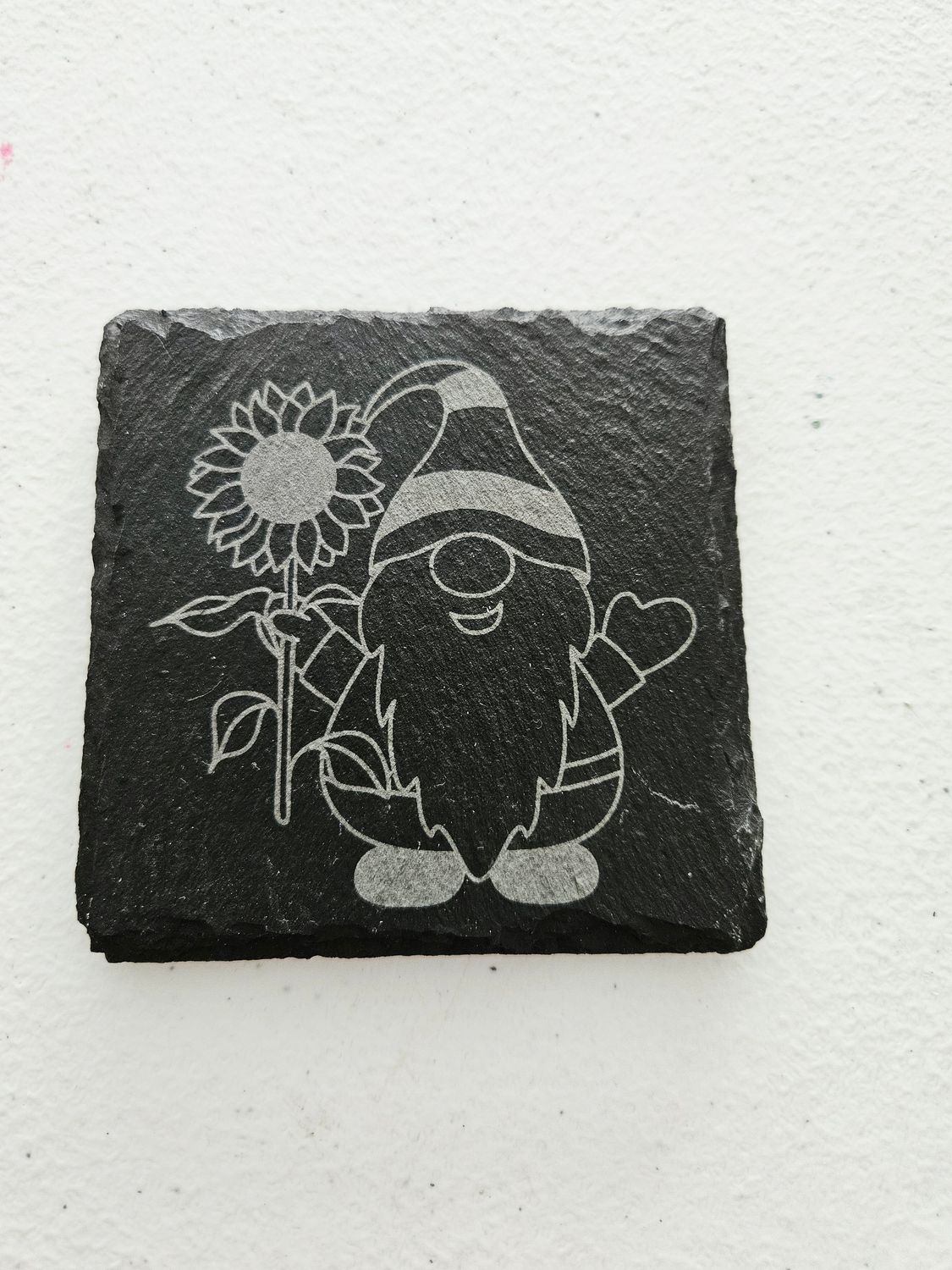 Male gnome with flower engraved slate coaster