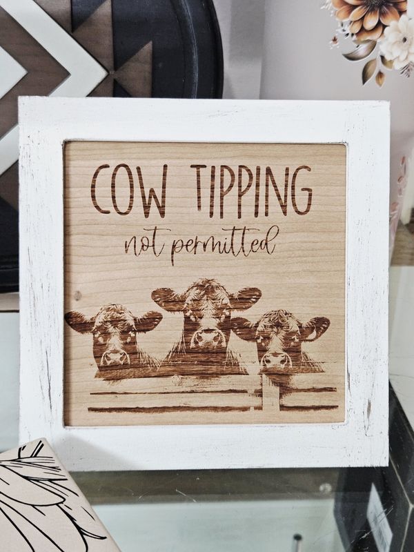 Cow tipping not permited sign