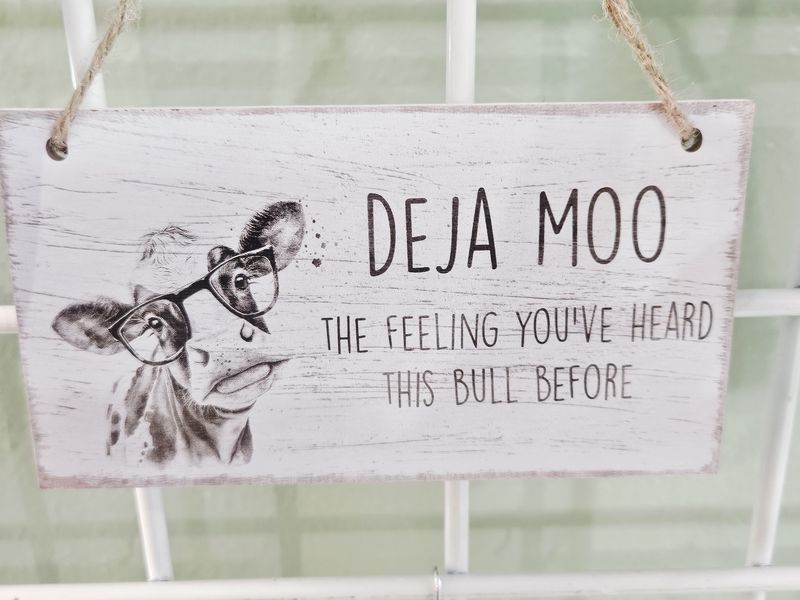 Deja Moo Sign