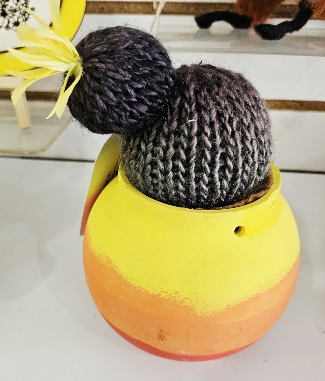 Sunset pot with knitted ball cactus