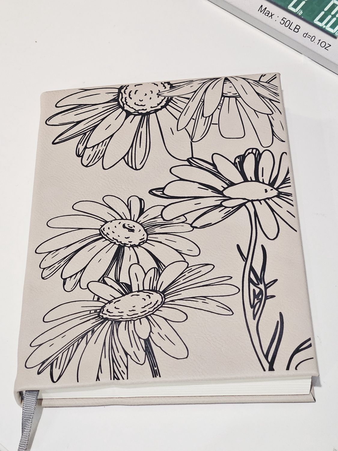 Daisy engraved journal