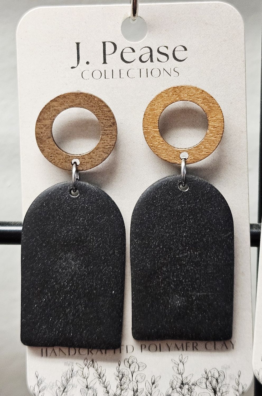 Enclosed Arch Black Dangling Earrings